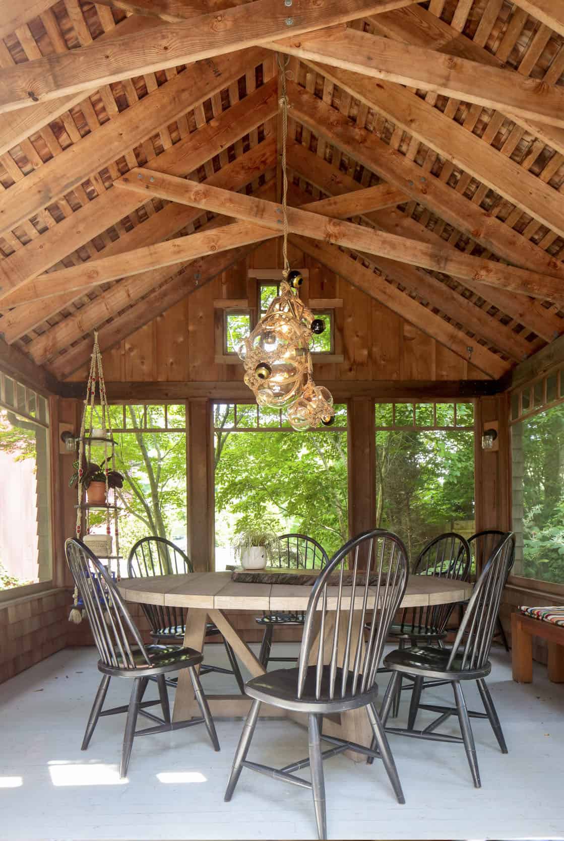 beach-style-screened-porch-dining-room