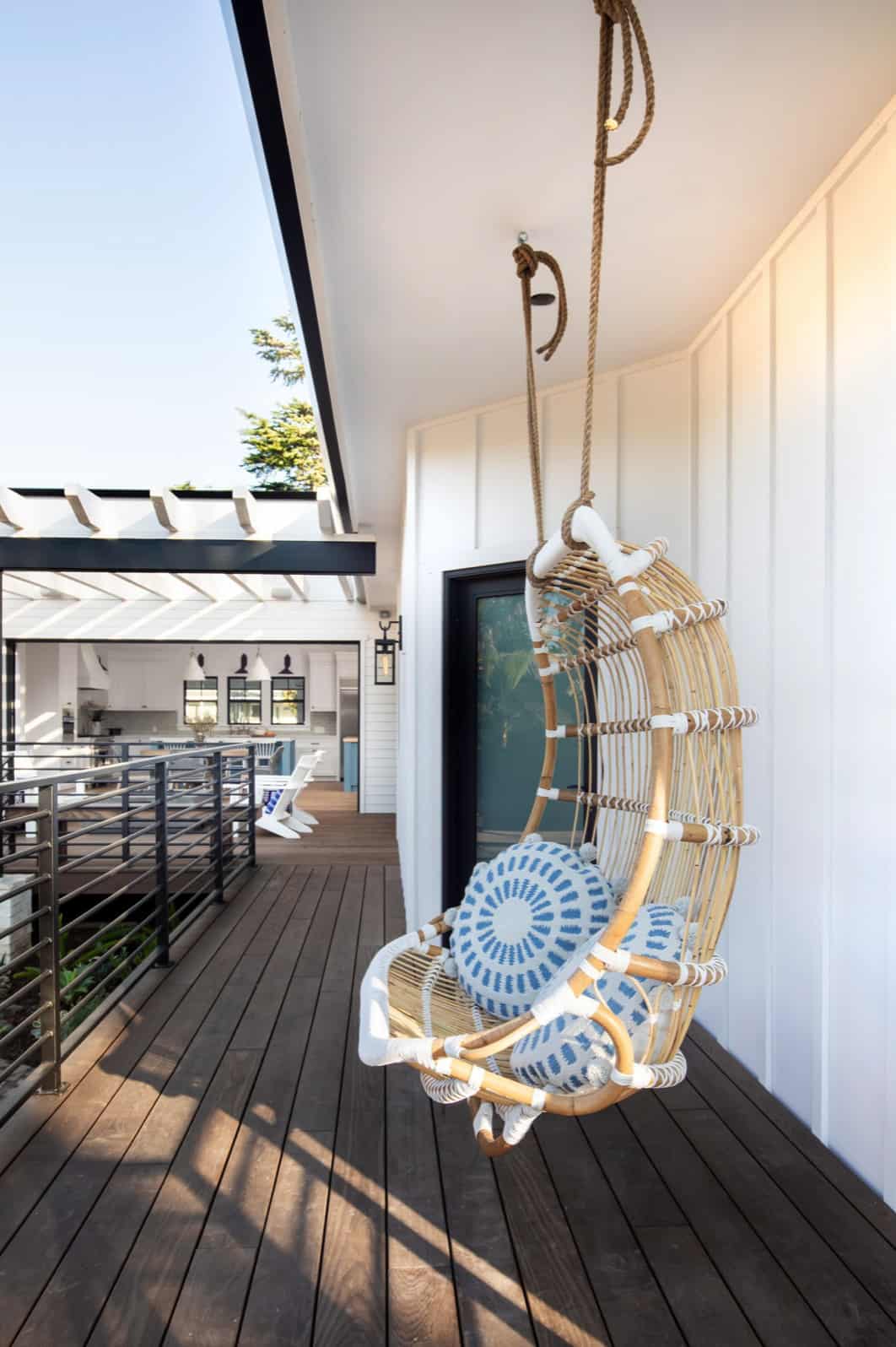 modern-farmhouse-covered-porch-hanging-swing