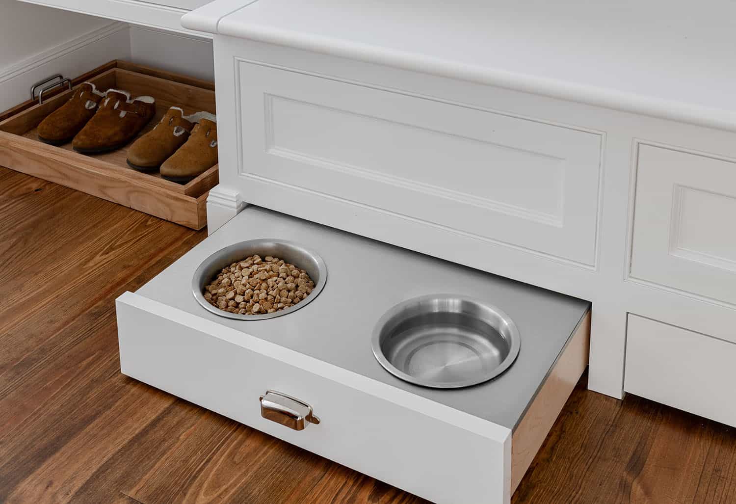 traditional-style-mudroom-with-a-pull-out-dog-bowl-station