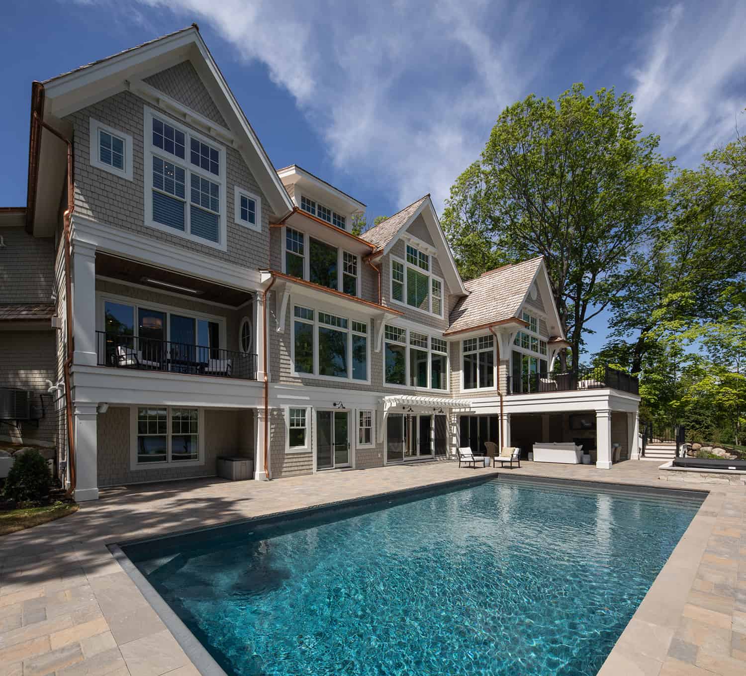 traditional-waterfront-home-exterior-with-a-pool