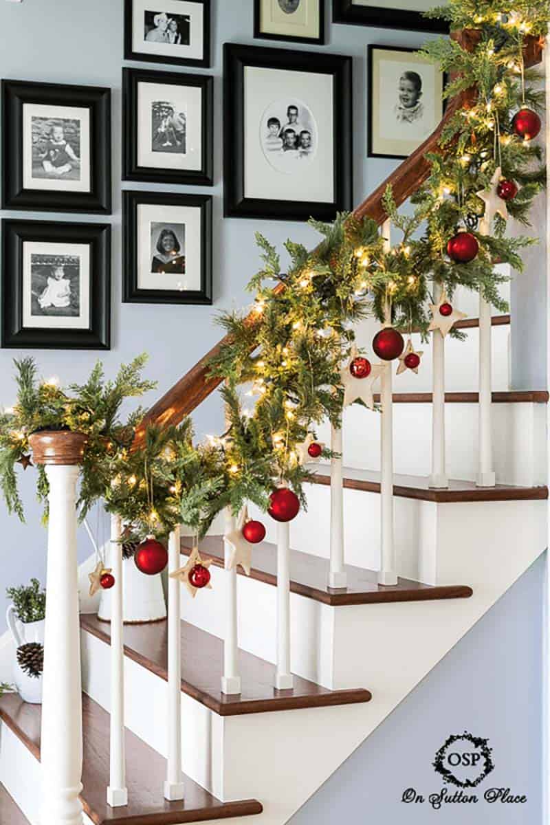 classic-christmas-garland-with-red-ornaments-on-the-stairs