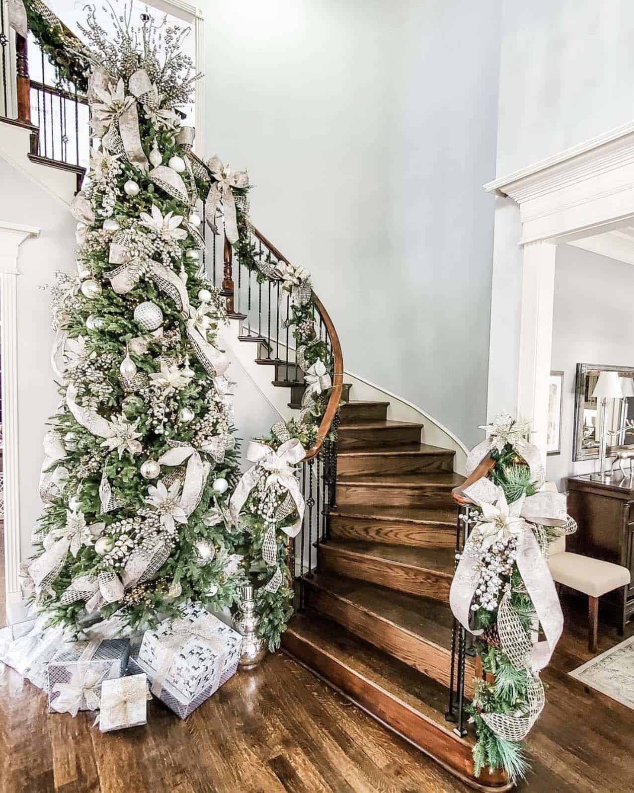 christmas-decorated-staircase-with-garland-and-silver-bows