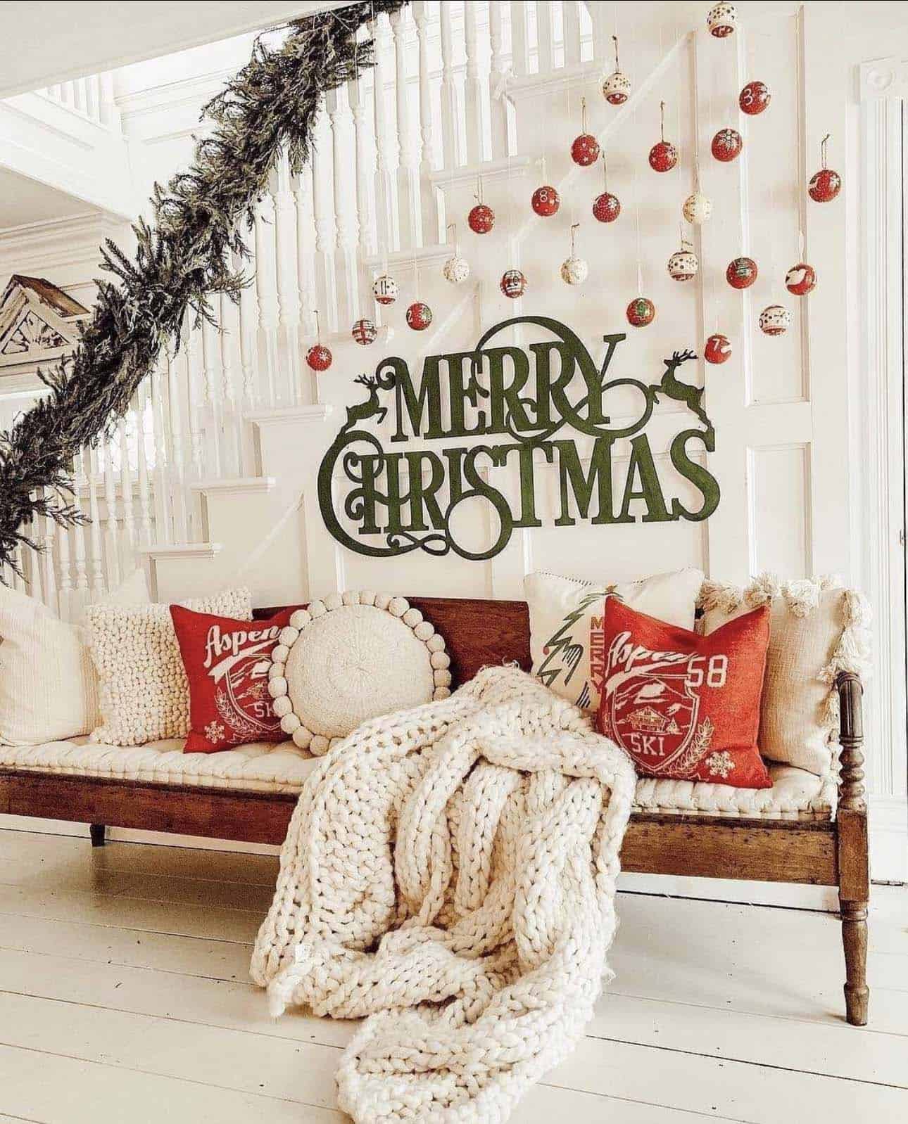 diy-stringed-ornaments-on-the-staircase-with-garland-christmas