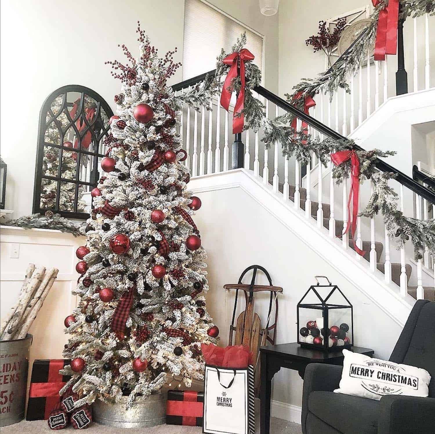 beautiful-christmas-decorated-staircase-with-garland-and-red-bows