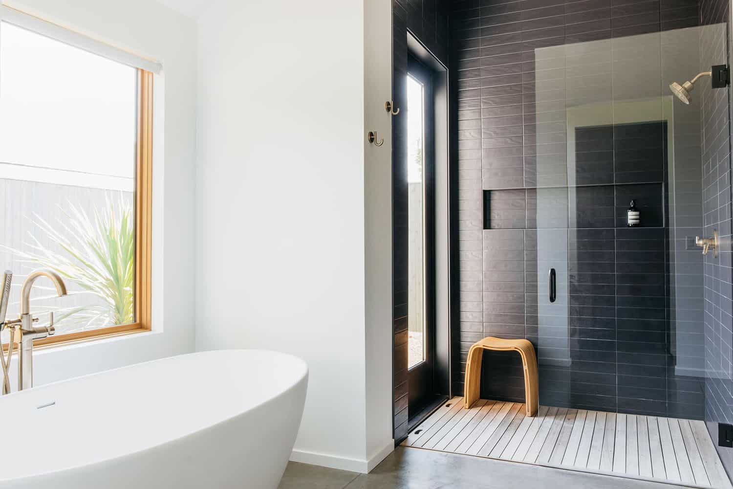 modern-scandinavian-bathroom-with-a-freestanding-tub-and-shower