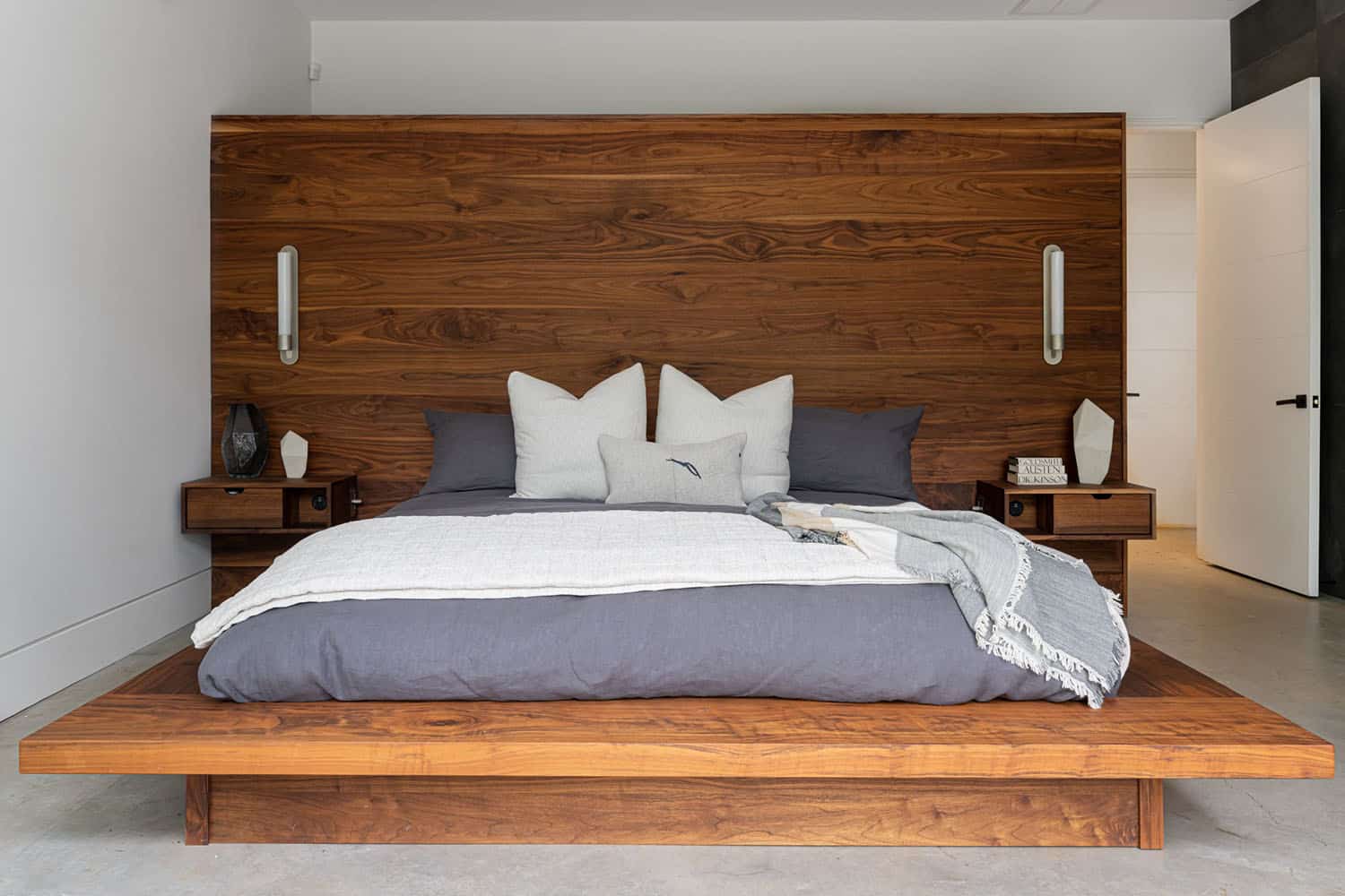 modern-bedroom-with-a-platform-bed-and-wood-headboard