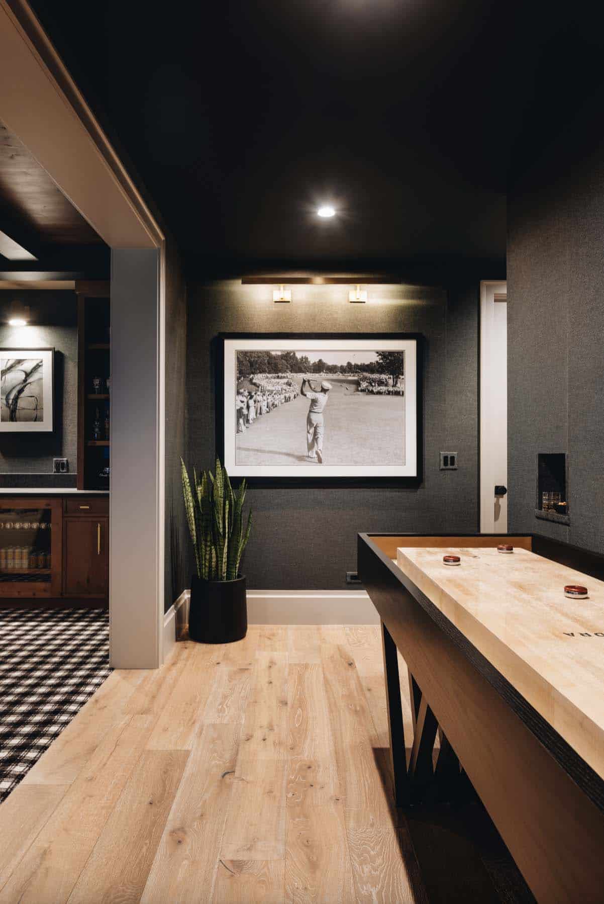 transitional-style-basement-with-a-shuffle-board
