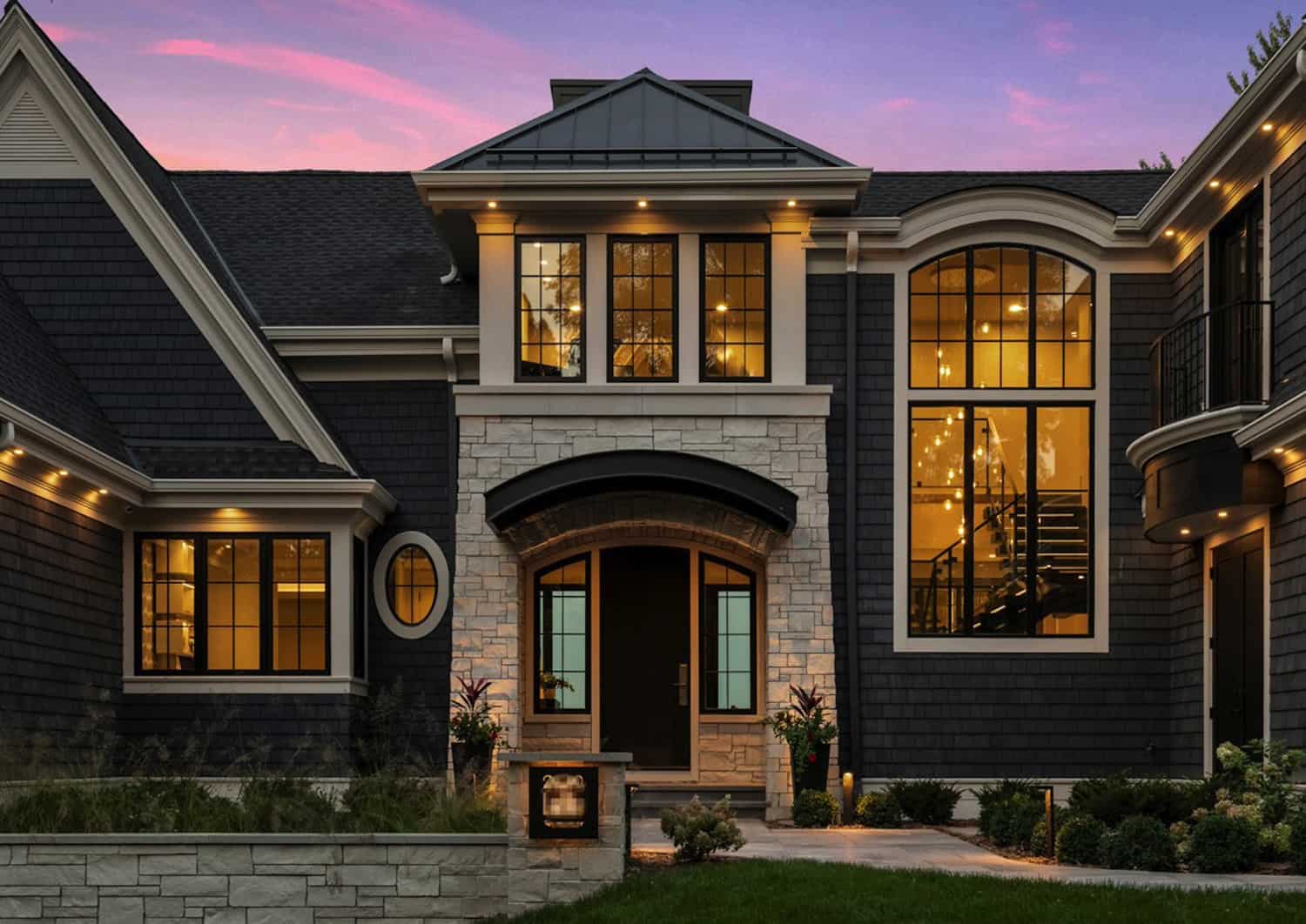 transitional-style-home-exterior-at-dusk
