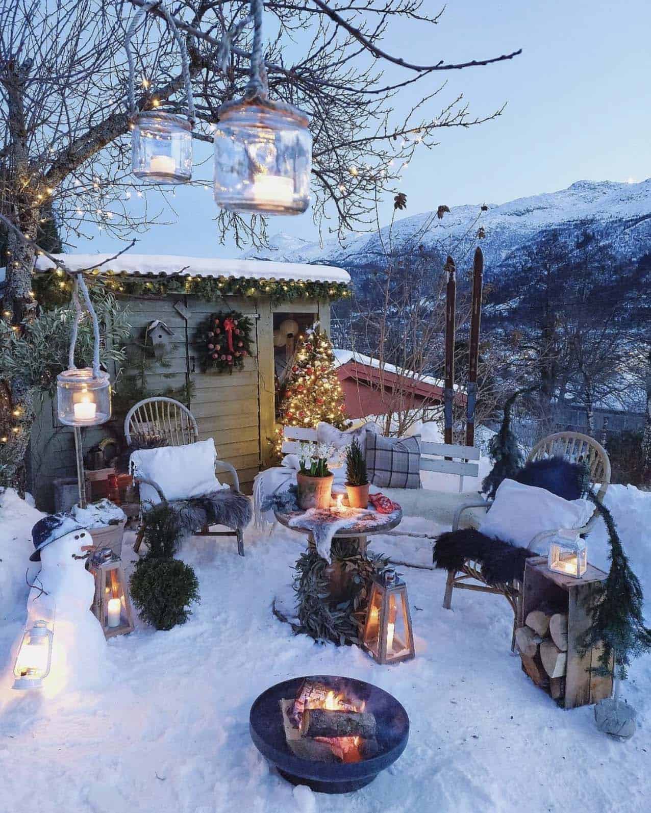 outdoor-snow-covered-patio-with-a-christmas-tree