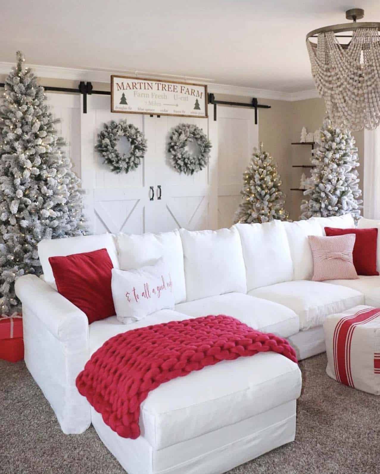 christmas-decorated-living-room-in-white-with-a-pop-of-red