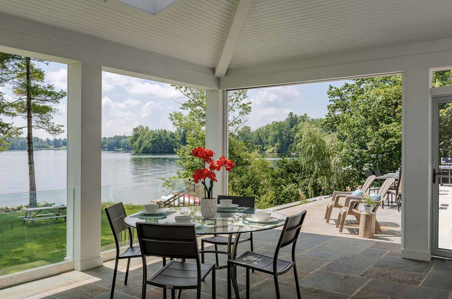 lake-house-covered-porch-with-outdoor-dining