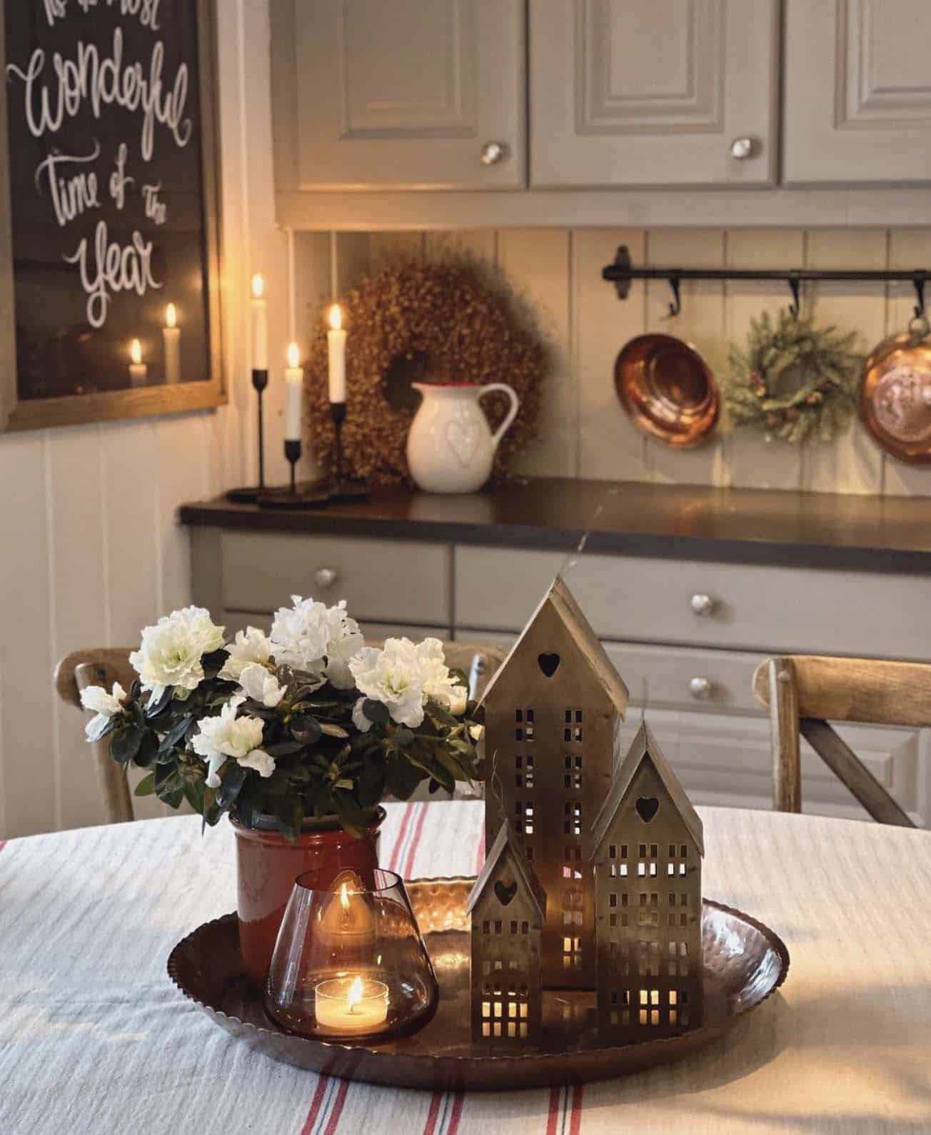 kitchen-dining-table-with-lighted-christmas-houses