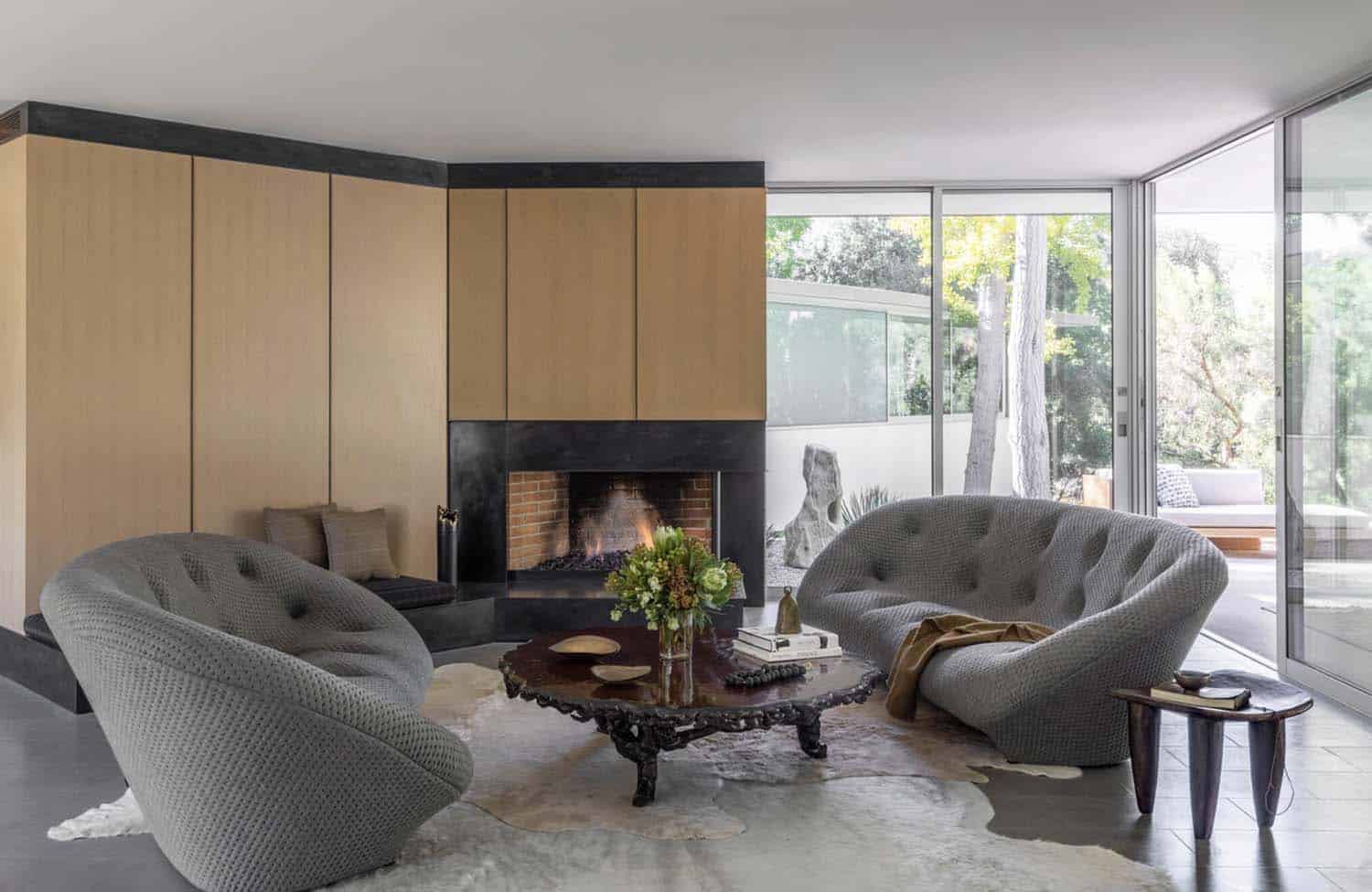 mid-century-living-room-with-a-fireplace