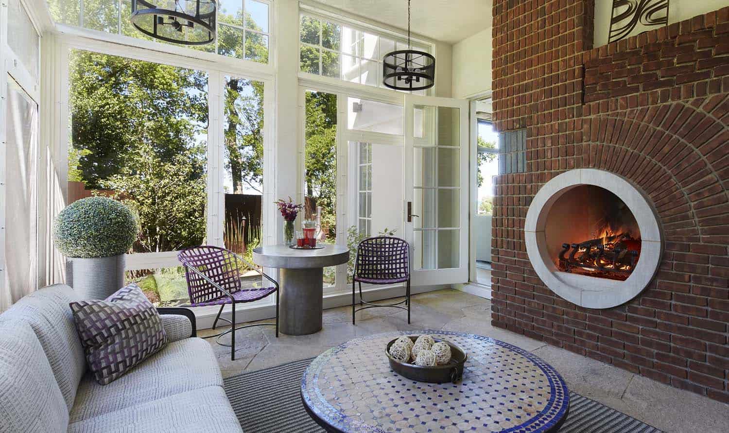 modern-sunroom-with-a-fireplace