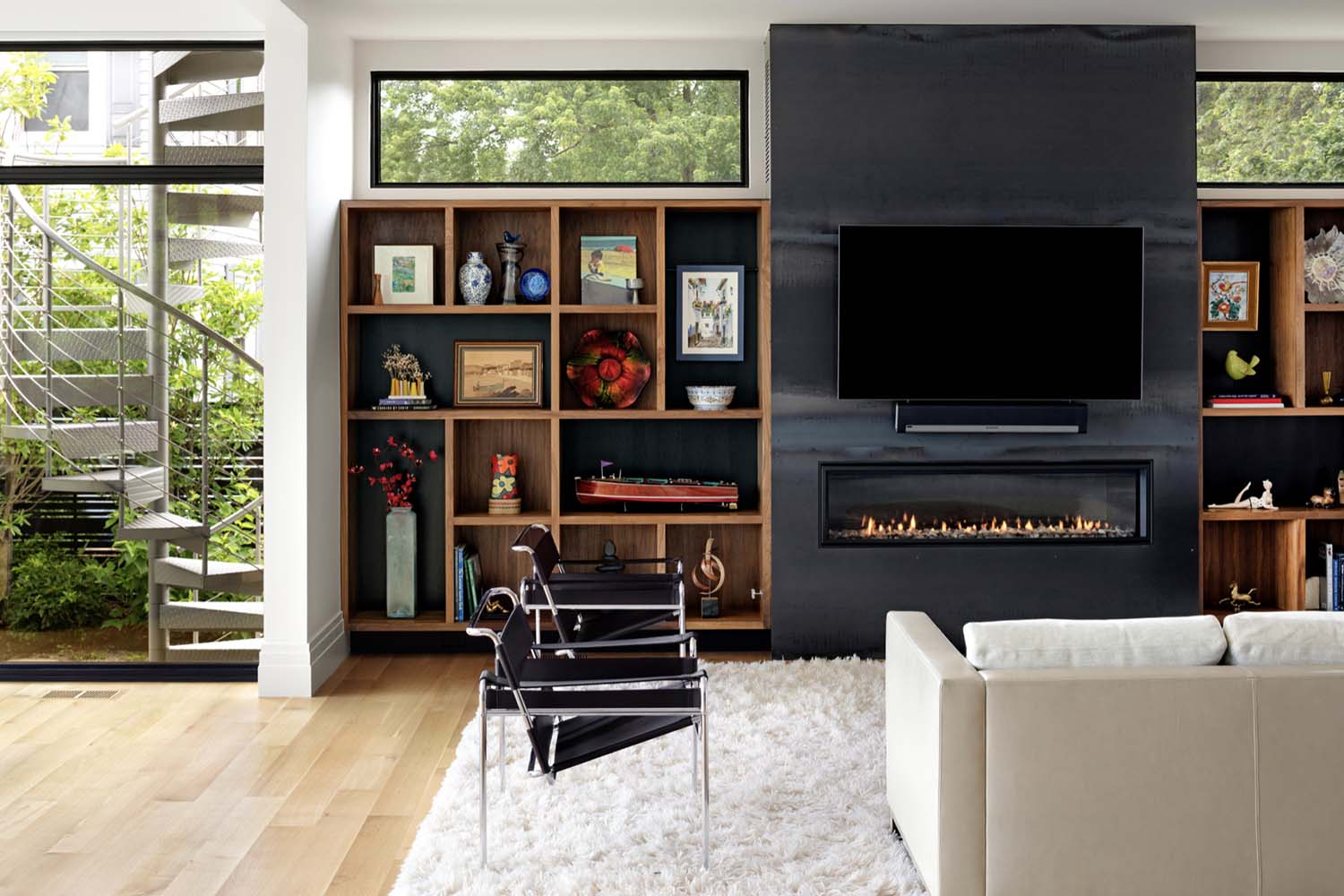 modern-family-room-with-steel-wrapped-fireplace