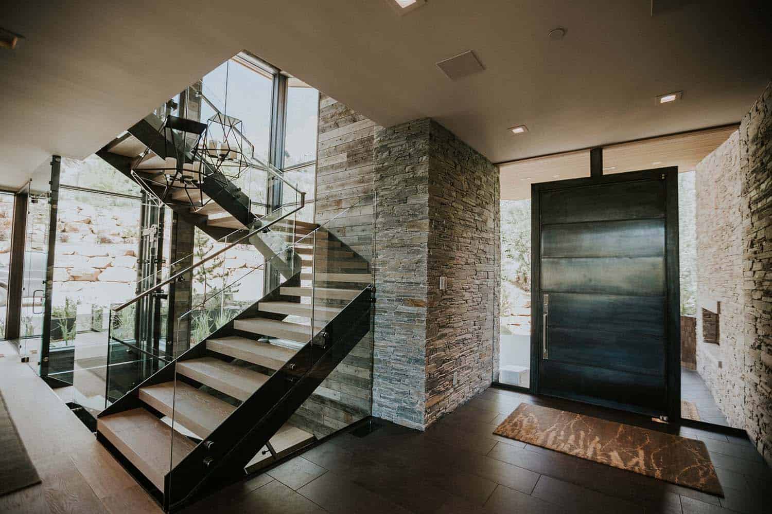 modern-mountain-home-entry-with-a-staircase