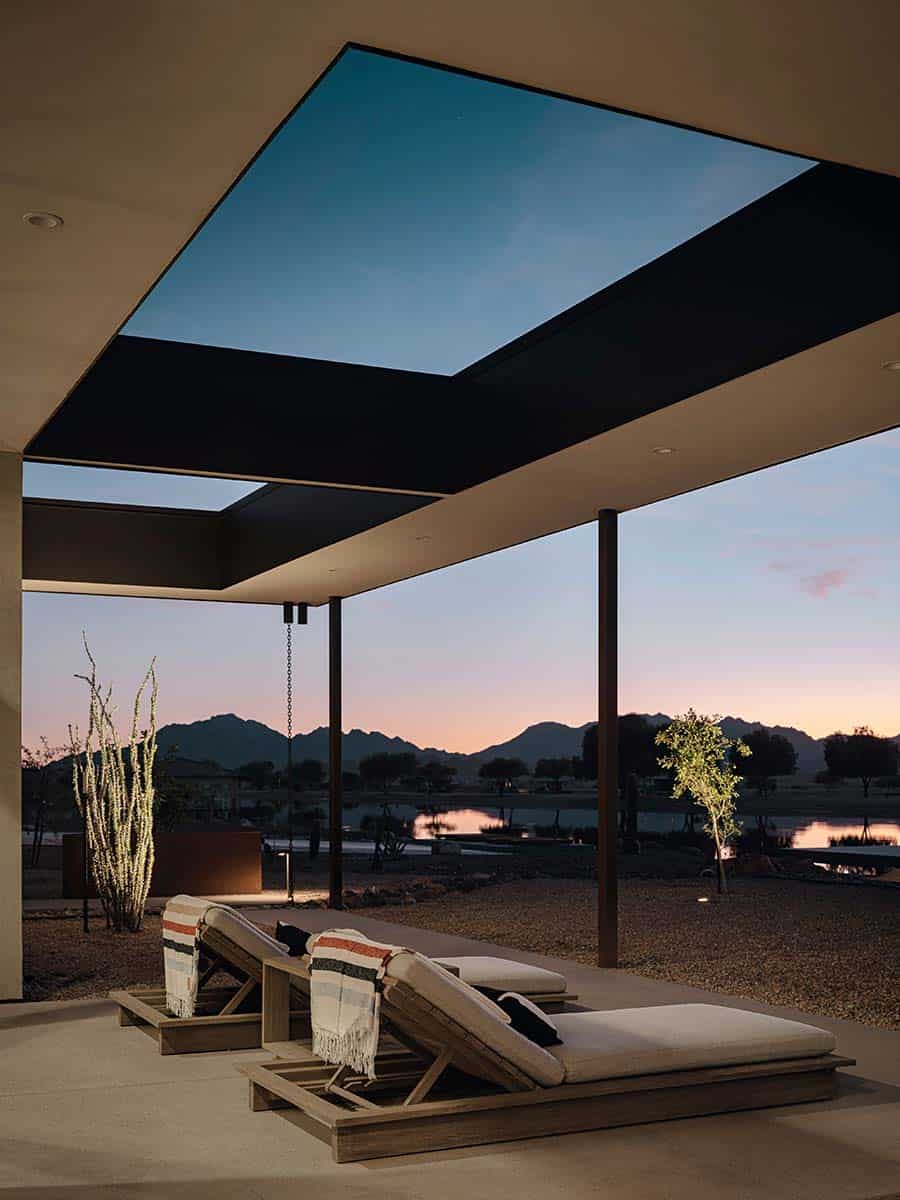 modern-desert-lake-house-patio-at-dusk