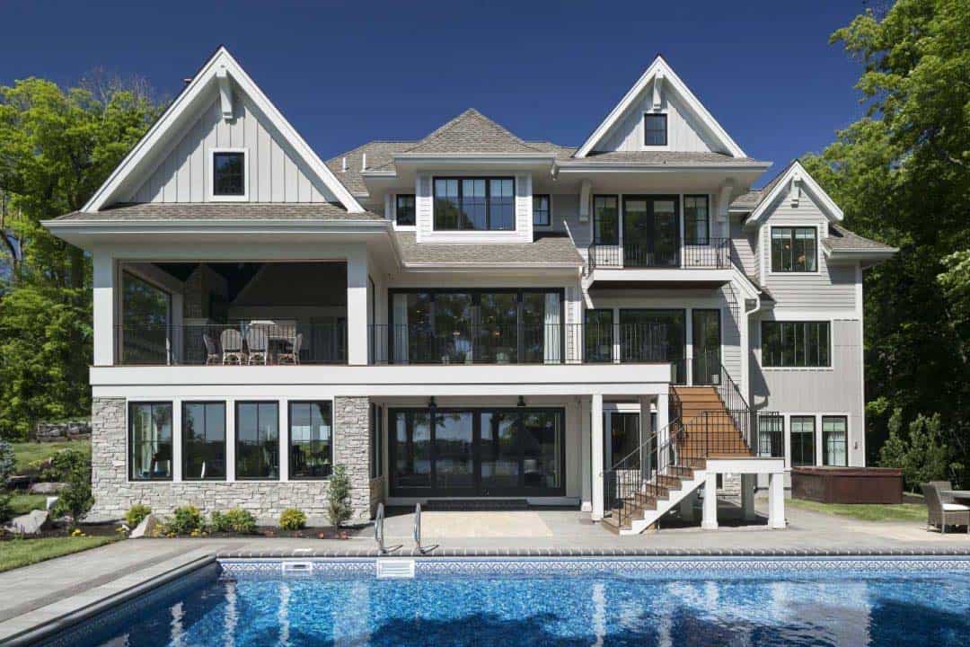 lakeside-retreat-transitional-exterior-with-a-pool