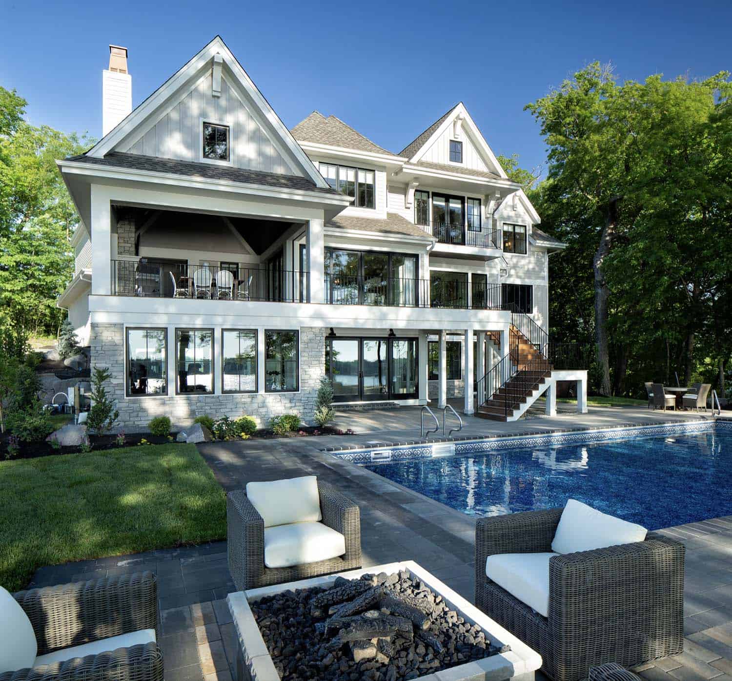lakeside-retreat-transitional-exterior-with-a-pool
