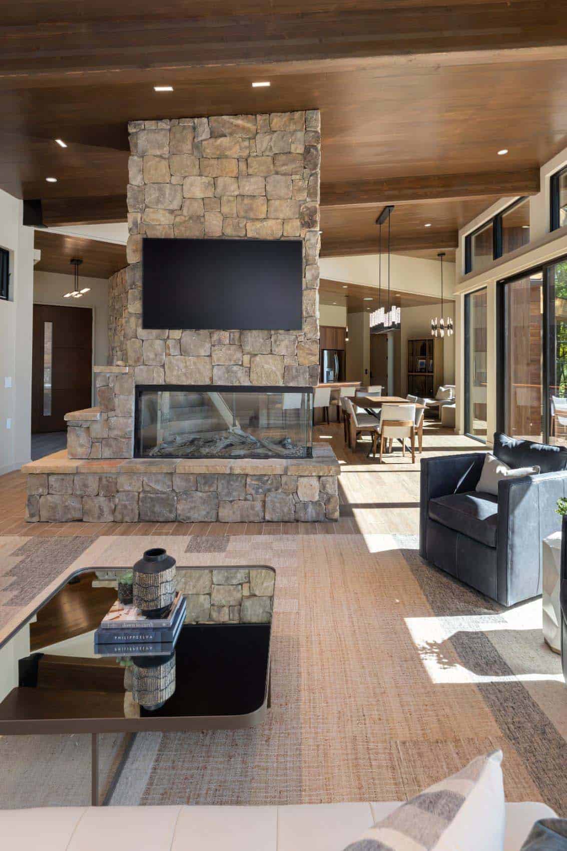 modern-living-room-with-a-dual-sided-fireplace