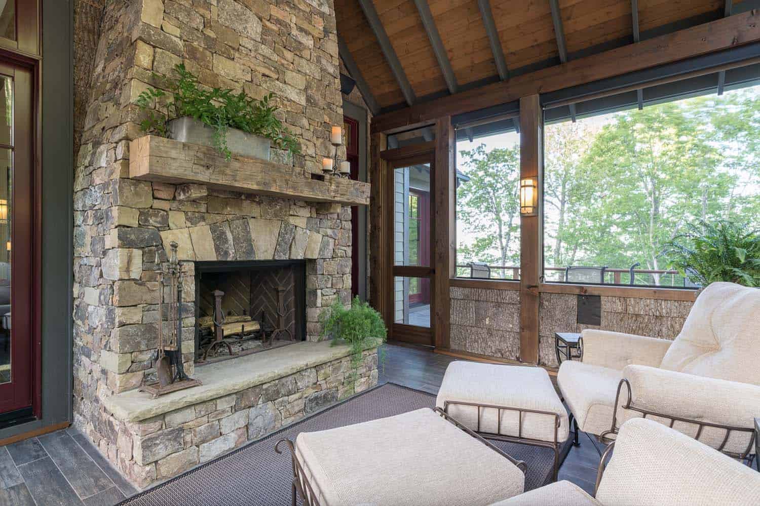screened-porch-stacked-stone-fireplace