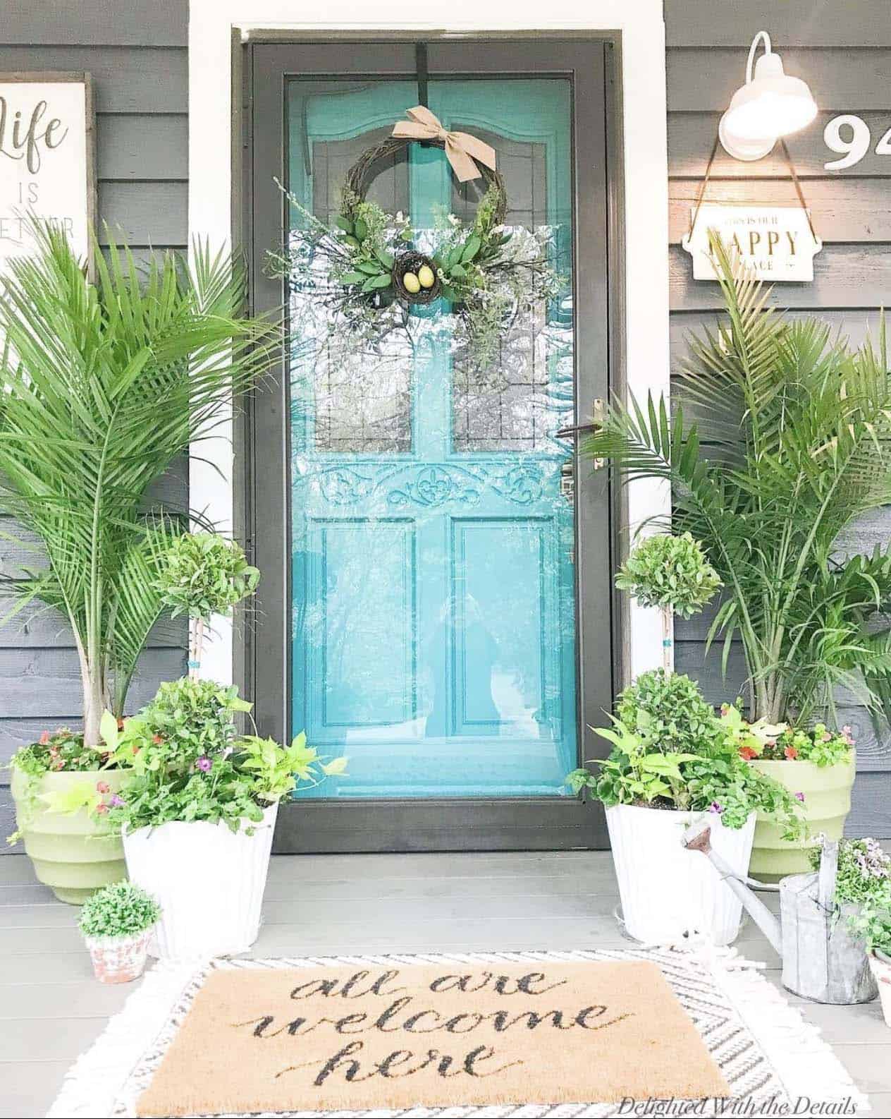 spring-porch-decor-with-a-blue-door