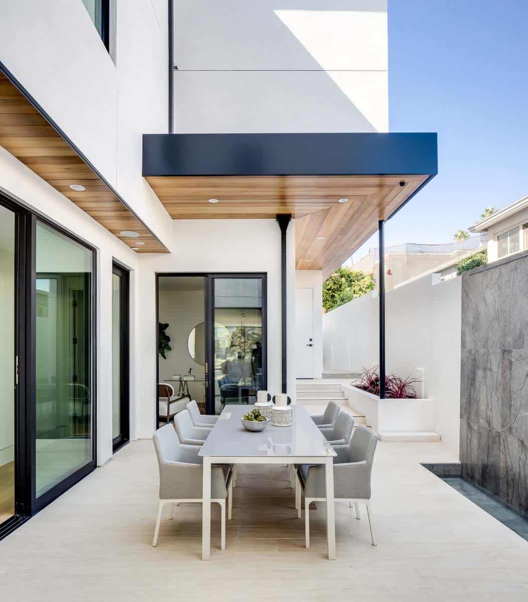 modern-patio-with-outdoor-dining-and-a-water-feature