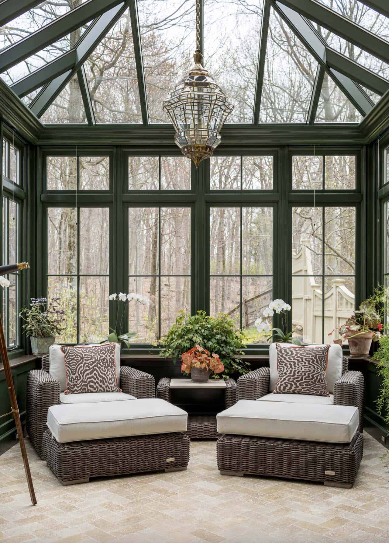 cozy-rustic-sunroom-with-a-view-of-woods