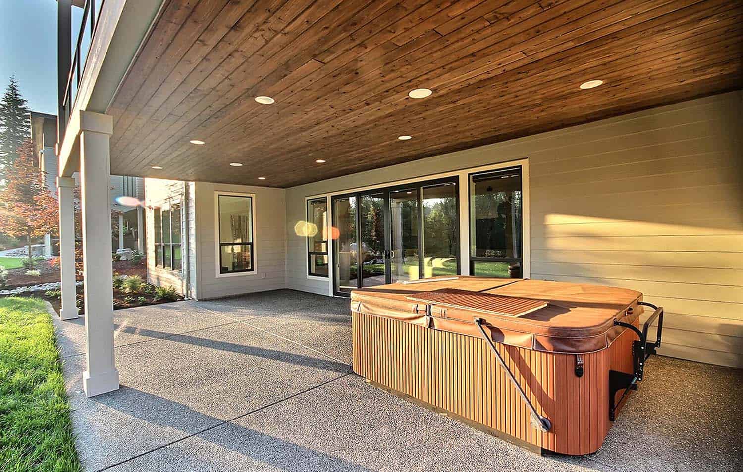 craftsman-home-exterior-patio-with-a-hot-tub