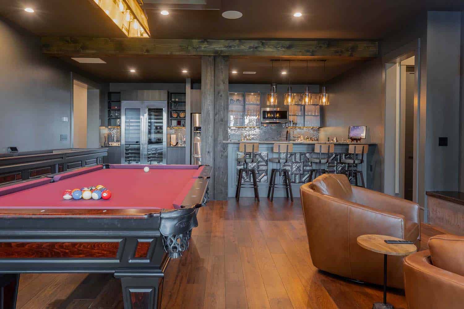craftsman-style-family-room-with-a-pool-table-and-home-bar