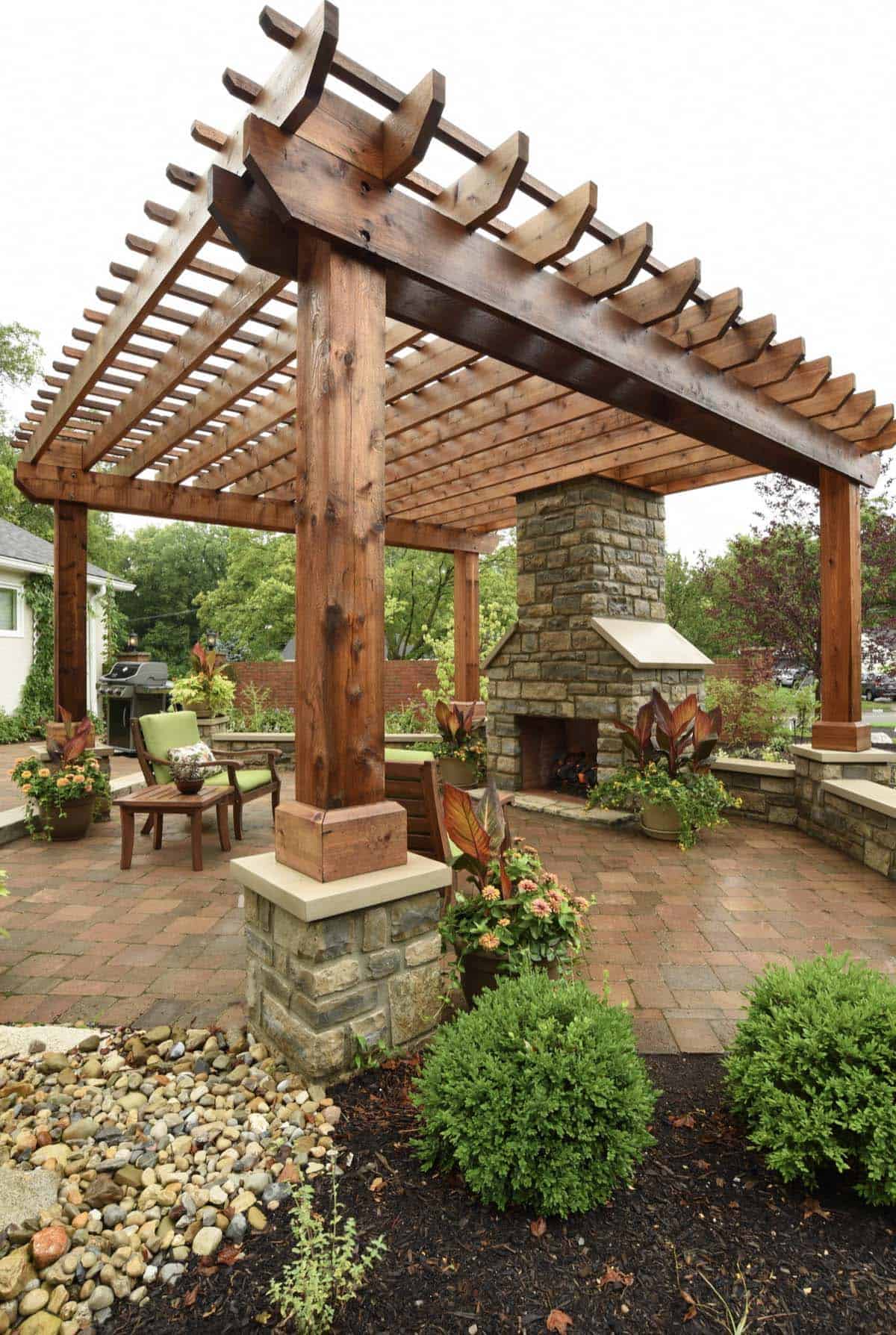 suburban-naturescape-backyard-pergola-design-with-a-fireplace