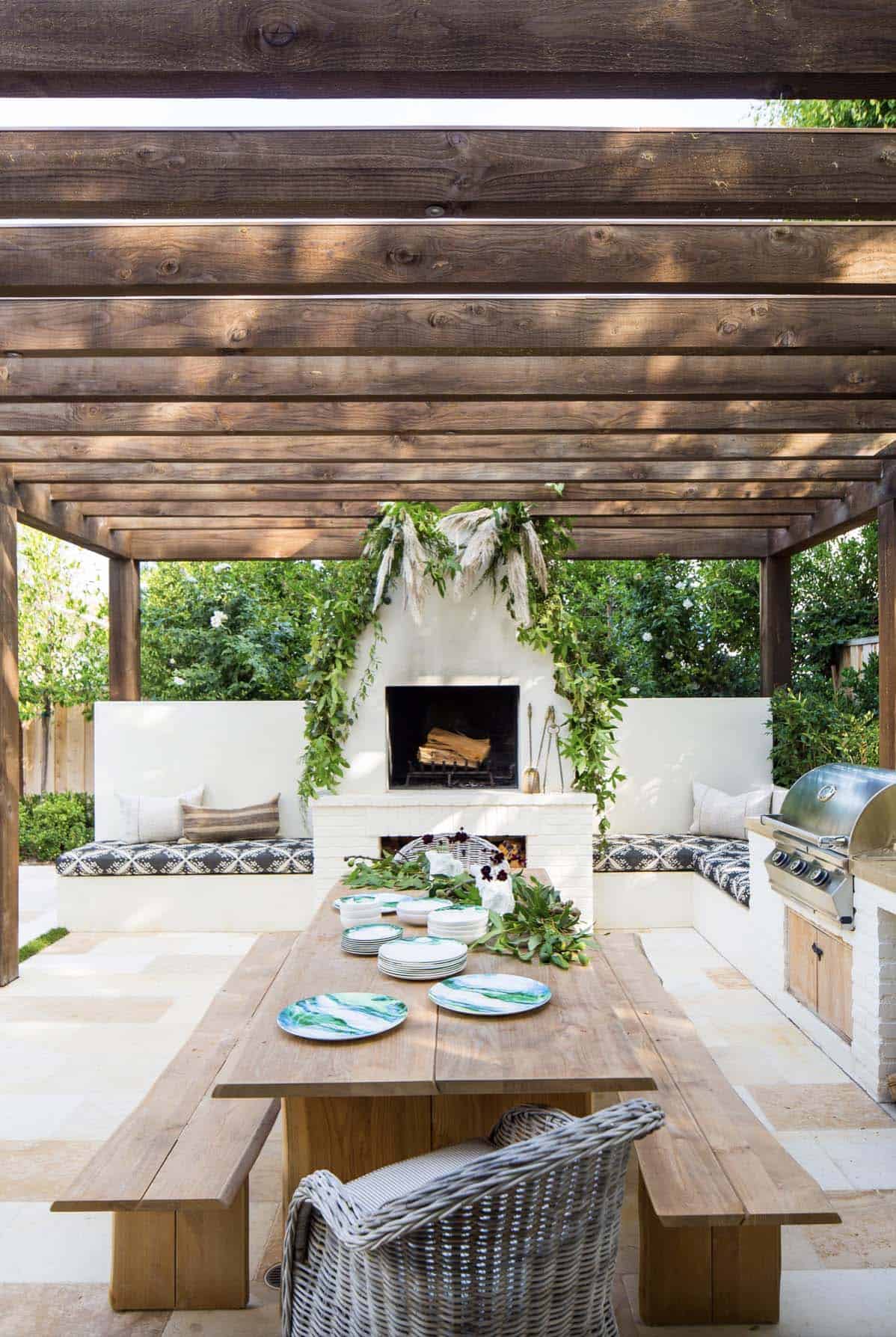 transitional-patio-with-a-pergola-and-fireplace