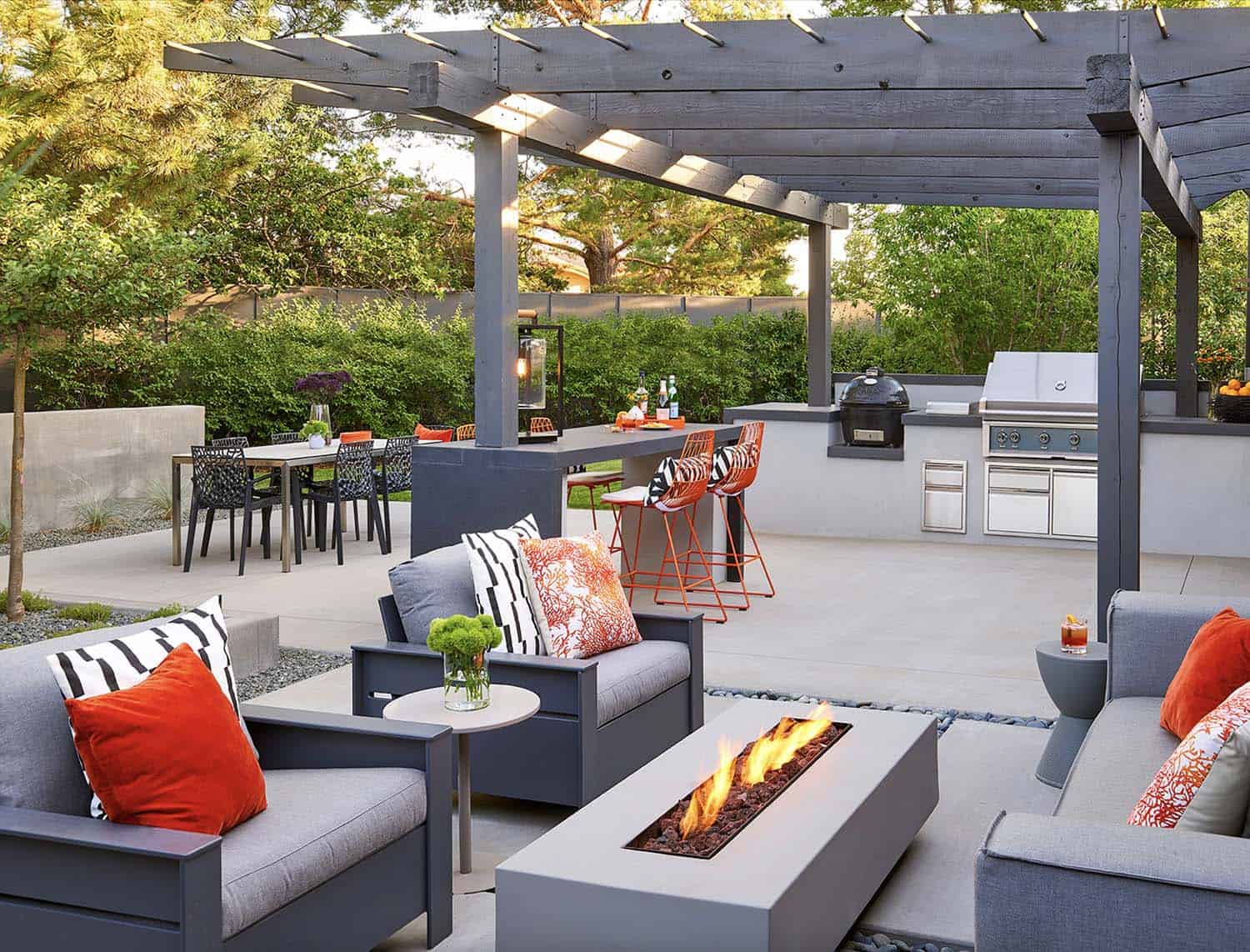 midcentury-patio-with-a-fire-pit-and-pergola