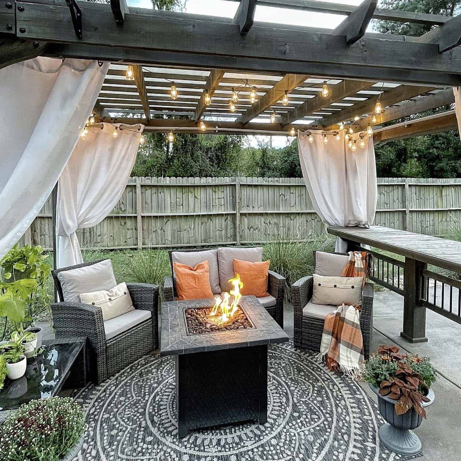 cozy-backyard-patio-with-and-a-pergola-and-string-lights