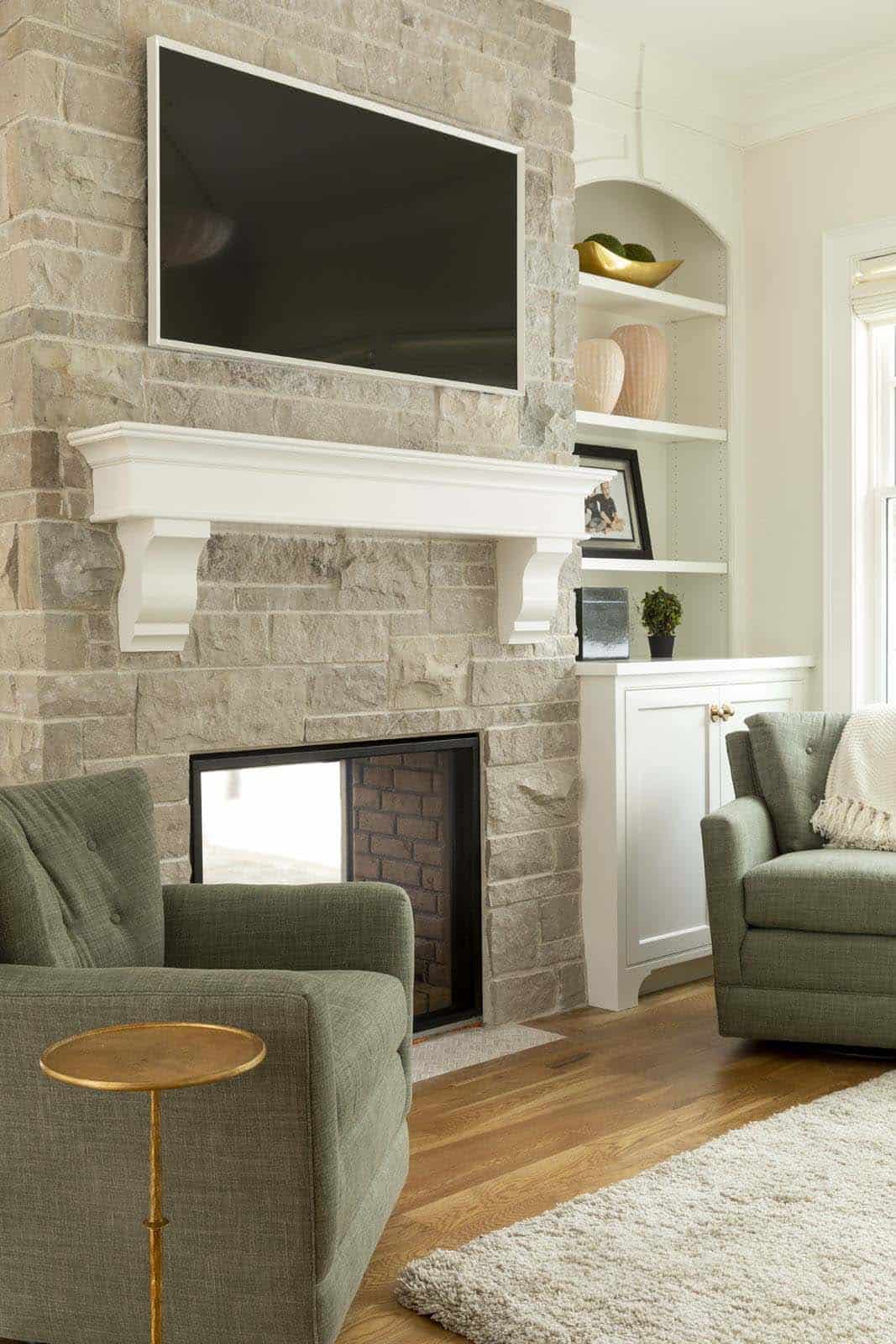 coastal-cape-cod-style-family-room-with-a-dual-sided-fireplace