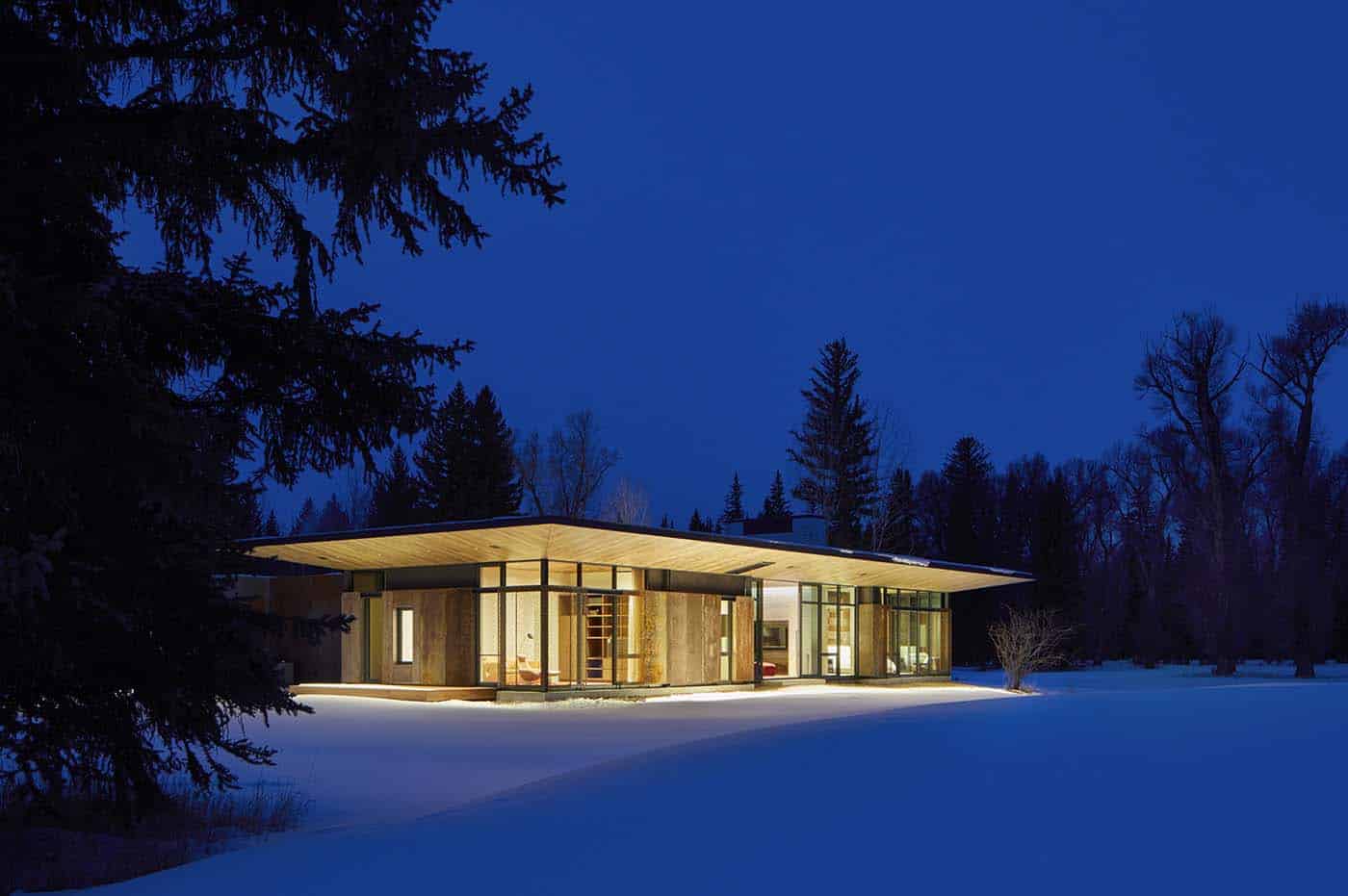 contemporary-guest-house-exterior-with-snow