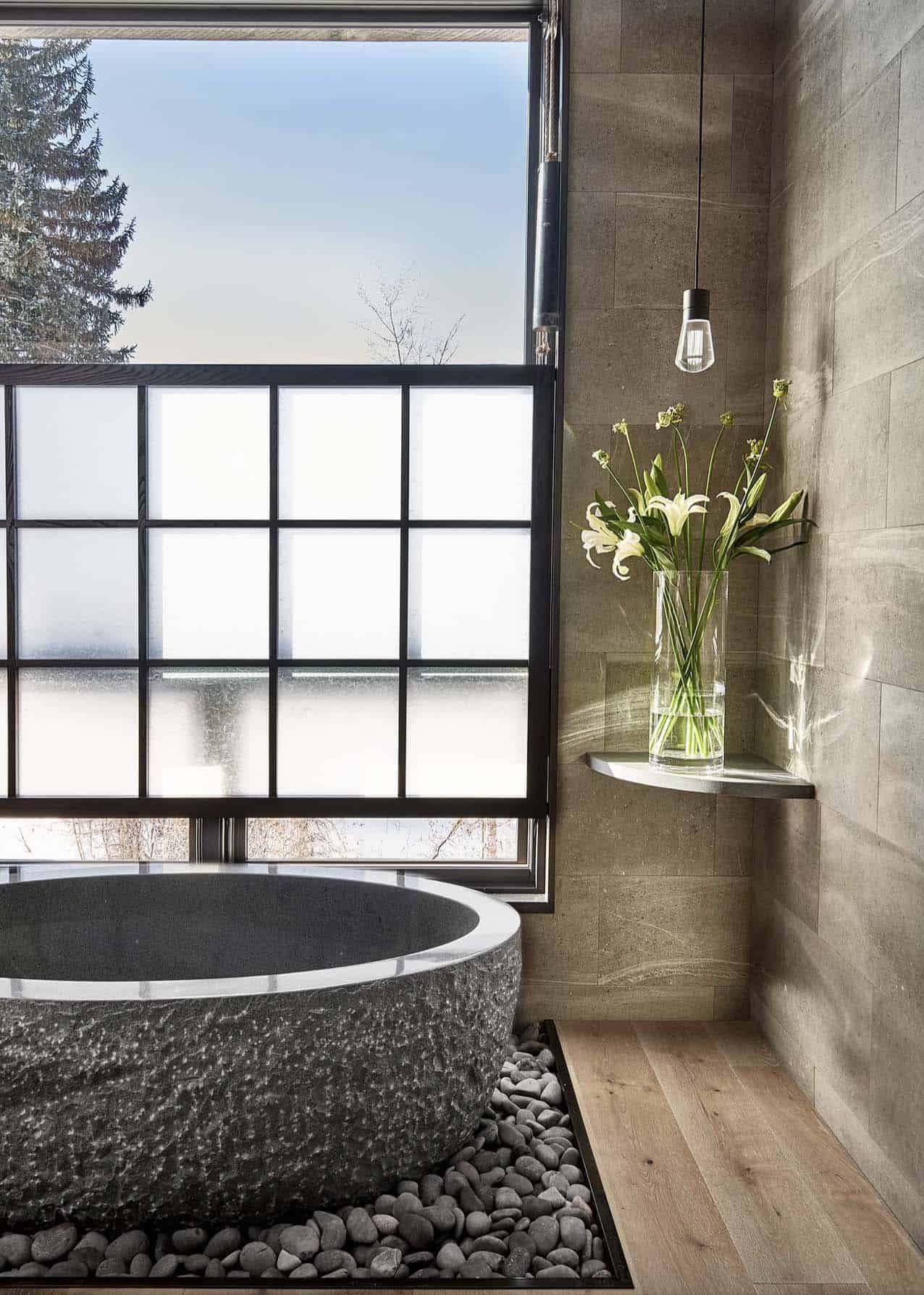 contemporary-bathroom-with-a-concrete-tub