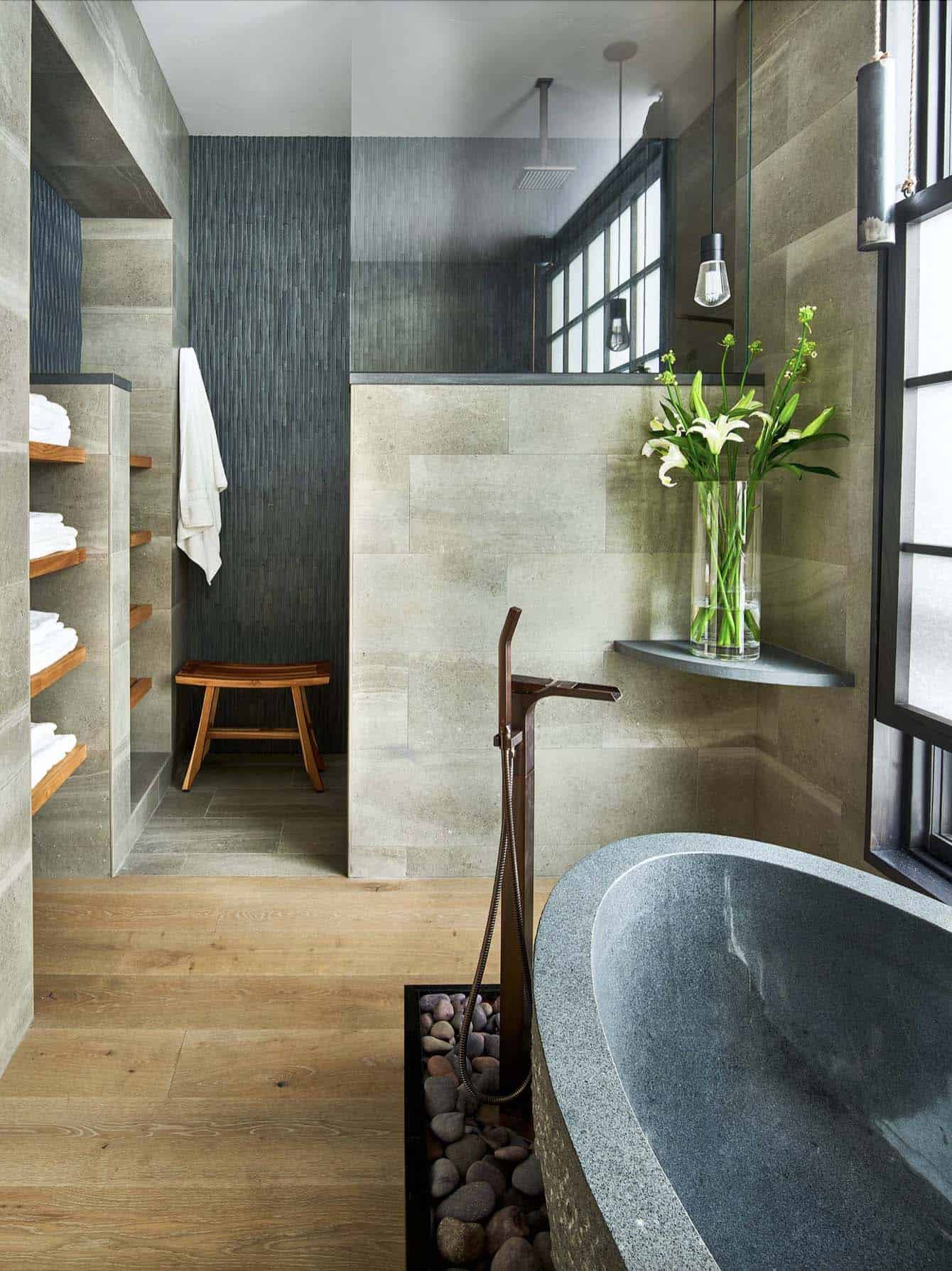 contemporary-bathroom-with-a-concrete-tub-and-walk-in-shower