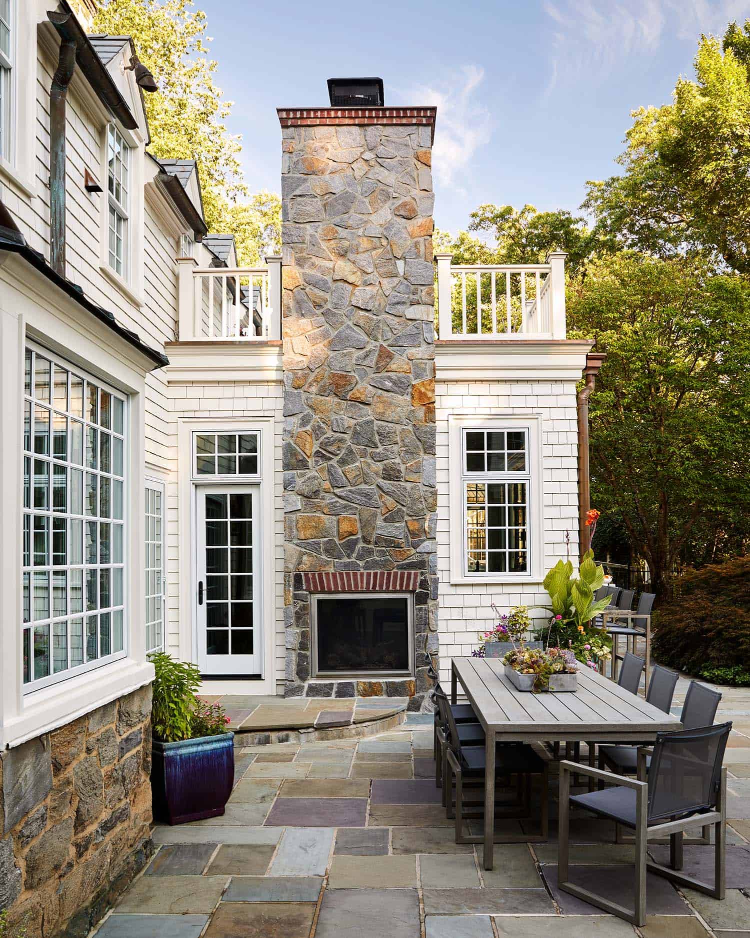exterior-fireplace-in-stone-and-shingle-home
