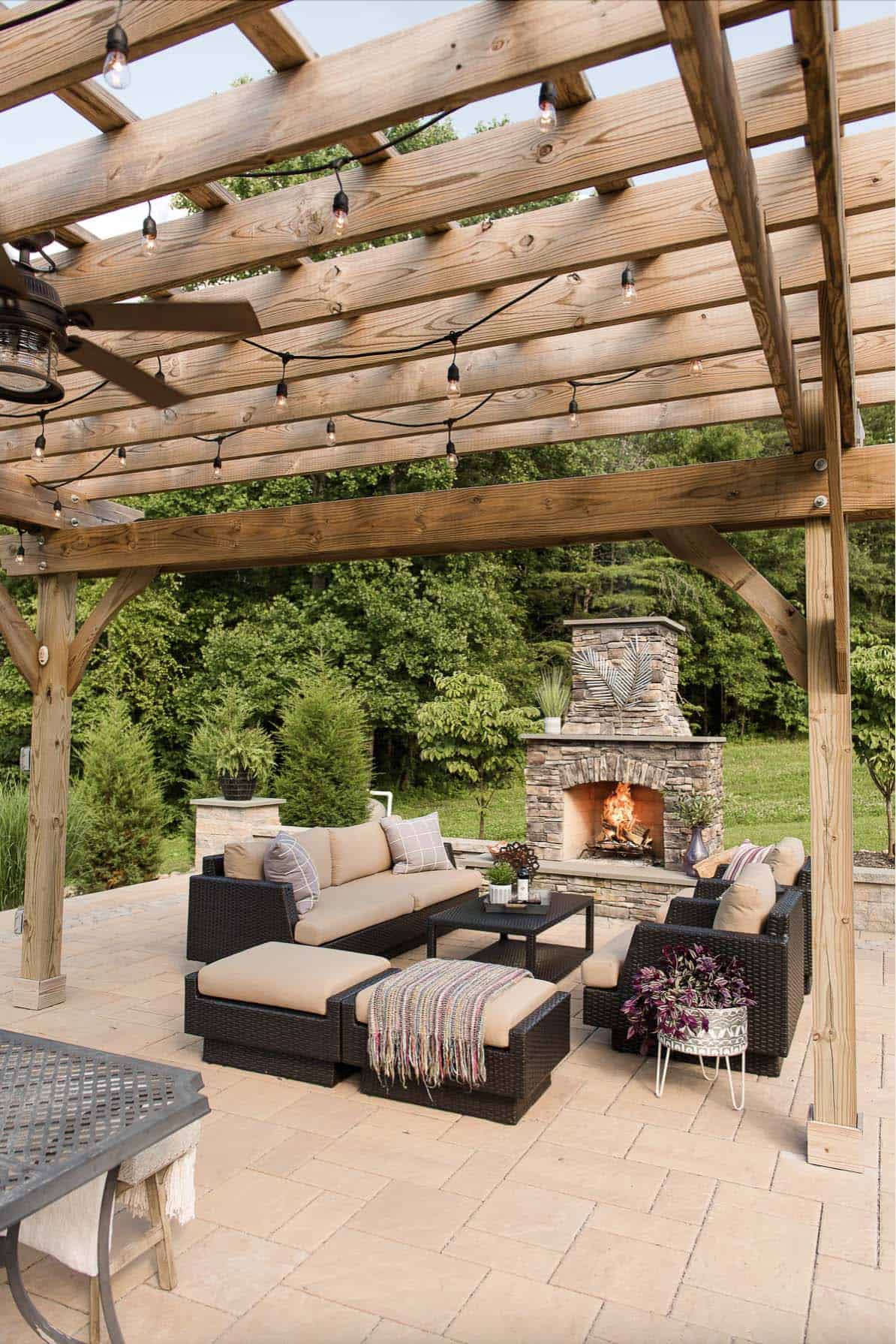 patio-with-a-fireplace-and-trellis