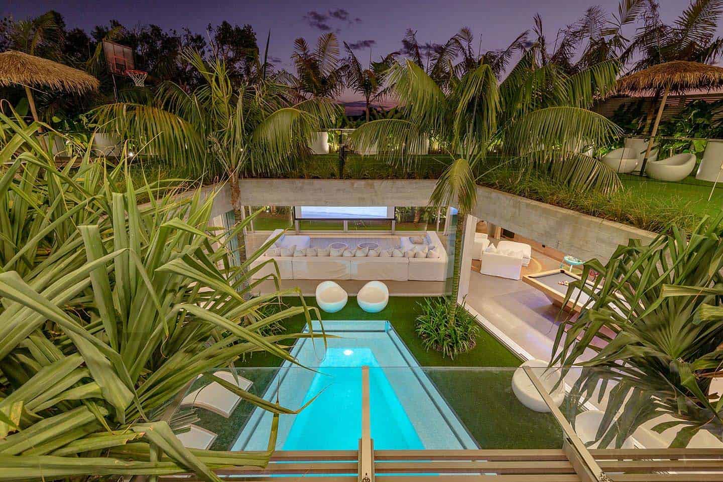 modern-beach-house-swimming-pool-at-dusk