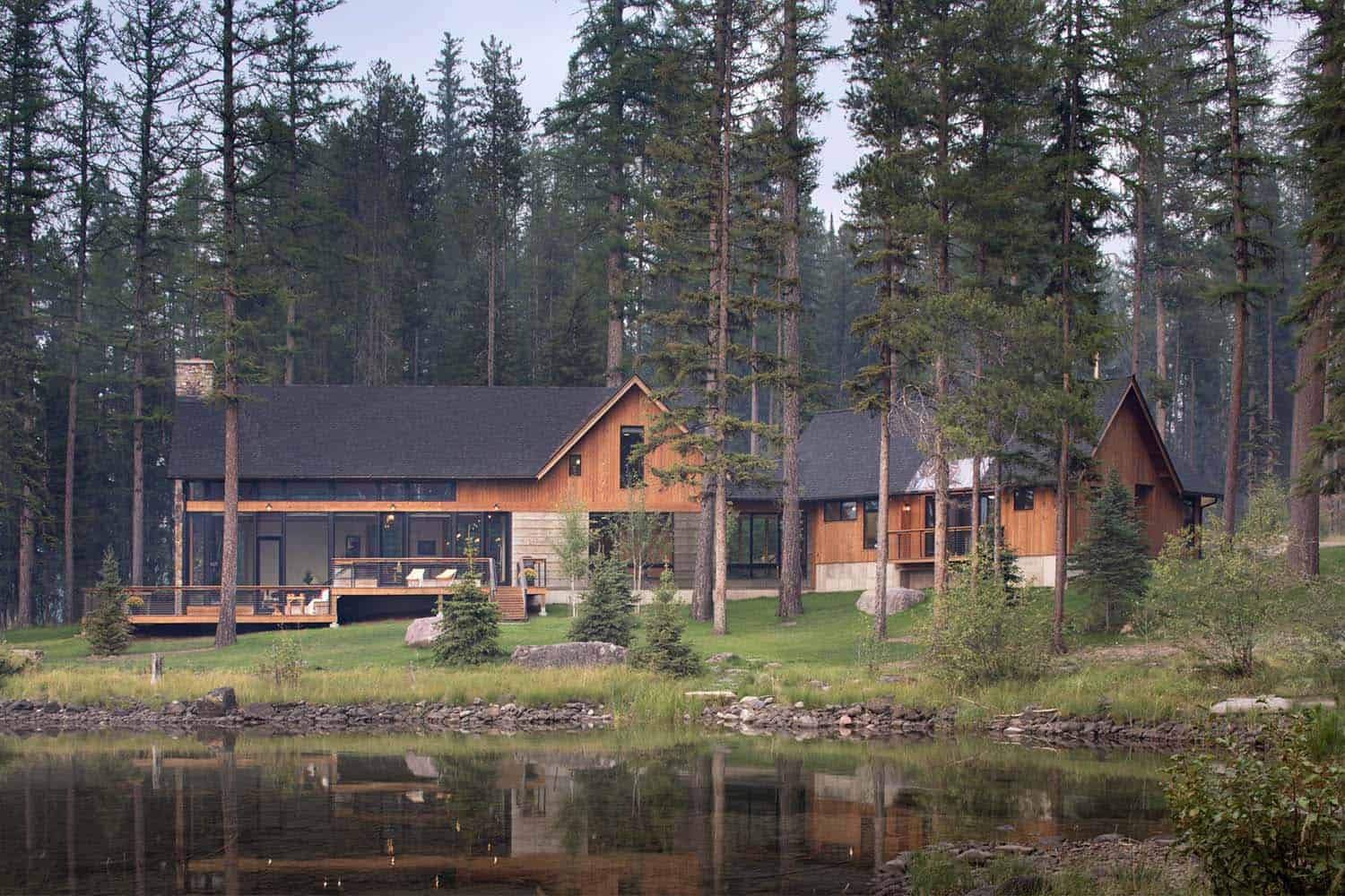 rustic-lake-cabin-exterior-with-a-water-view