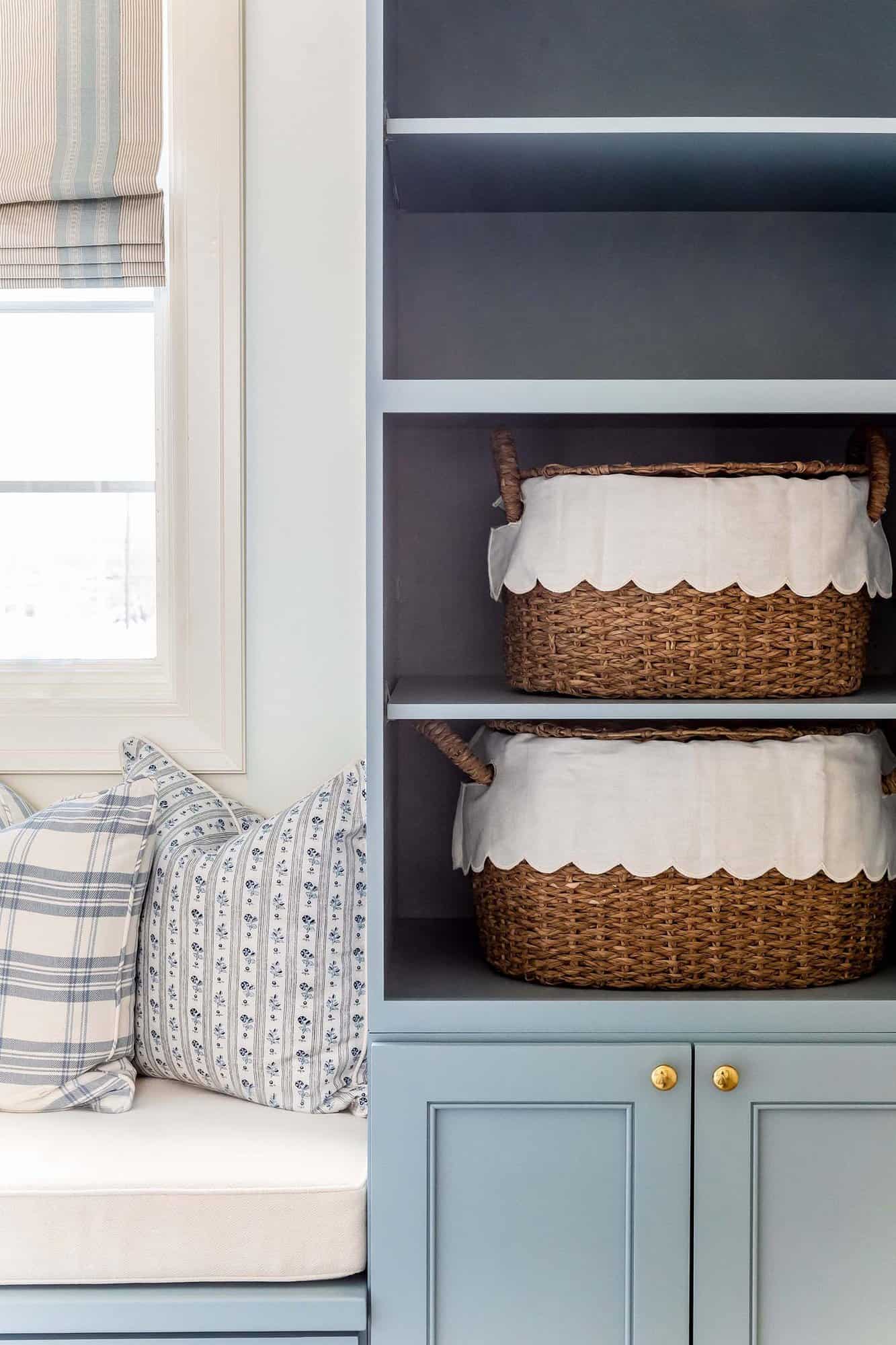 traditional-style-kids-bedroom-window-seat-open-shelf-detail-with-rattan-baskets