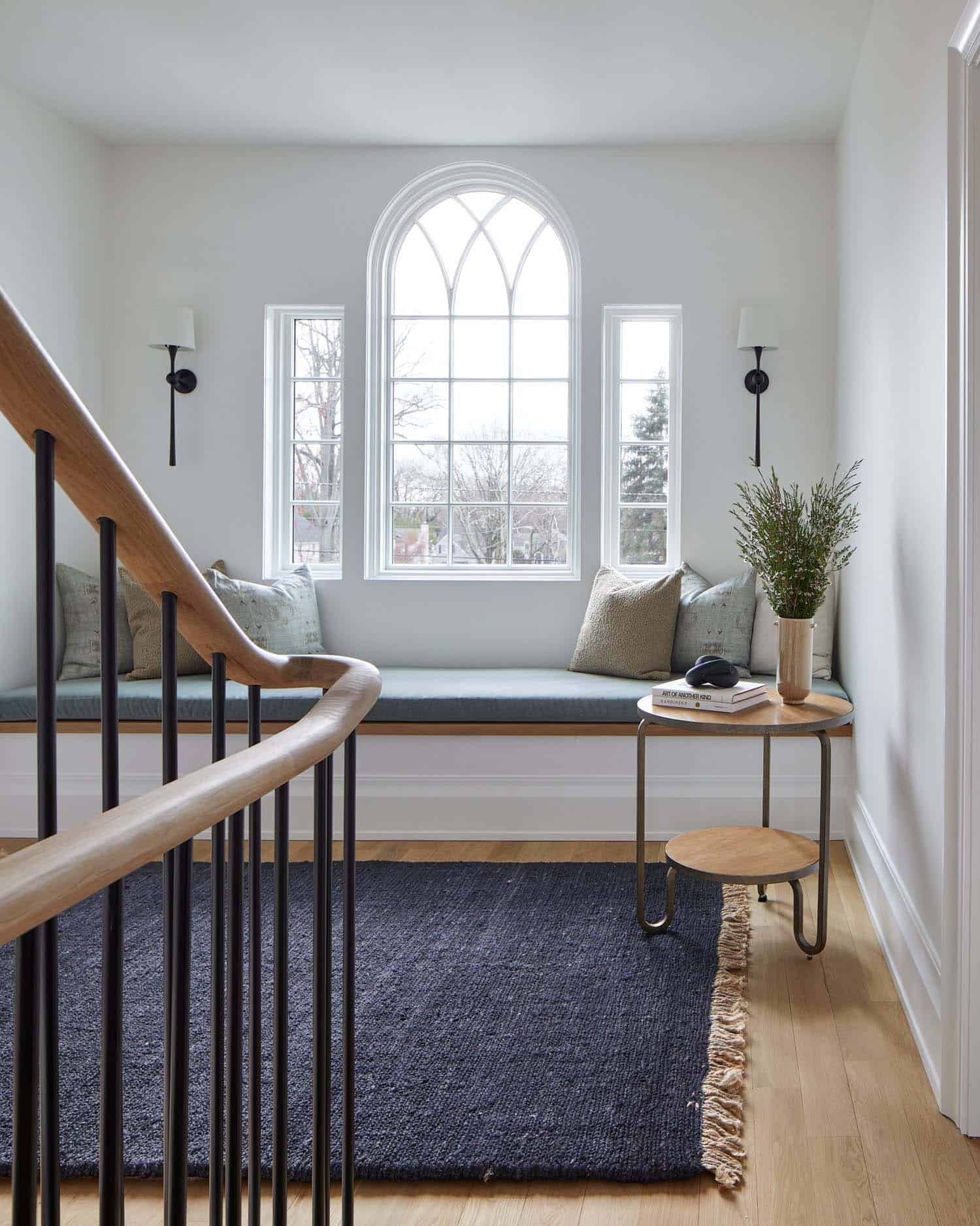 transitional-hallway-with-a-window-seat