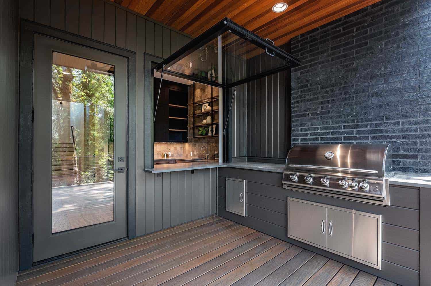 contemporary-covered-porch-with-a-built-in-barbeque