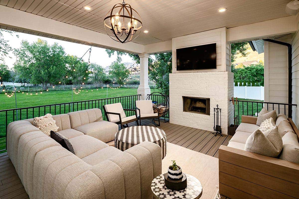 farmhouse-style-home-deck-with-a-fireplace
