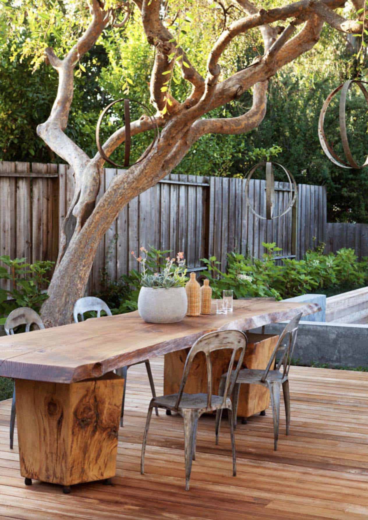 backyard-deck-with-a-large-tree-and-privacy-wall