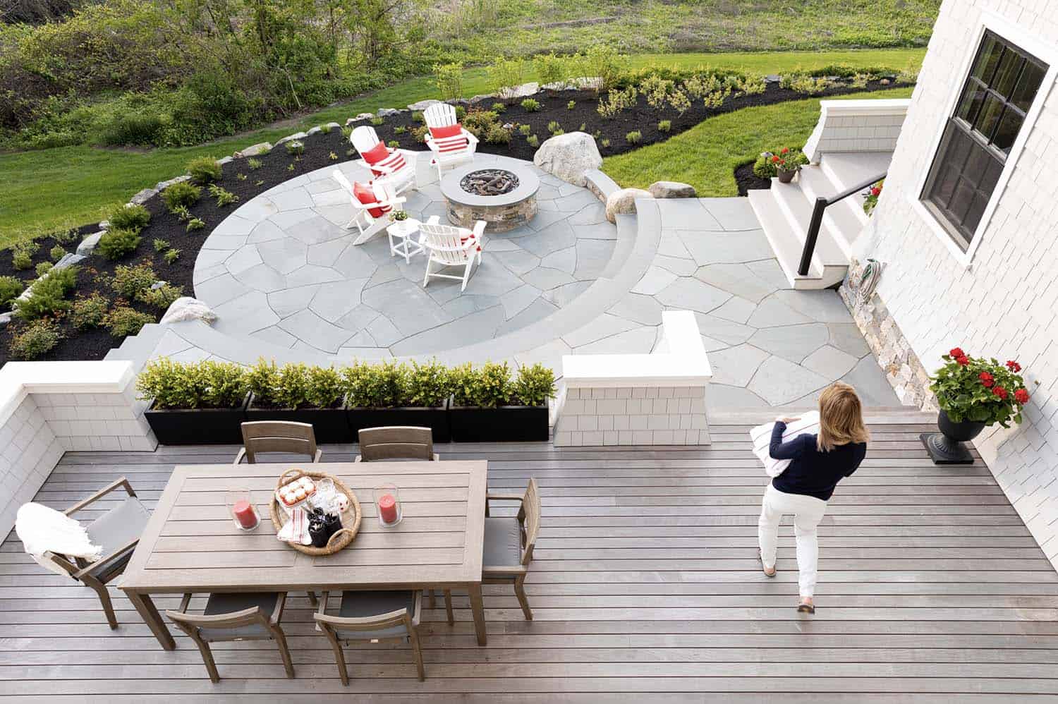 beach-style-deck-stepping-down-to-stone-patio