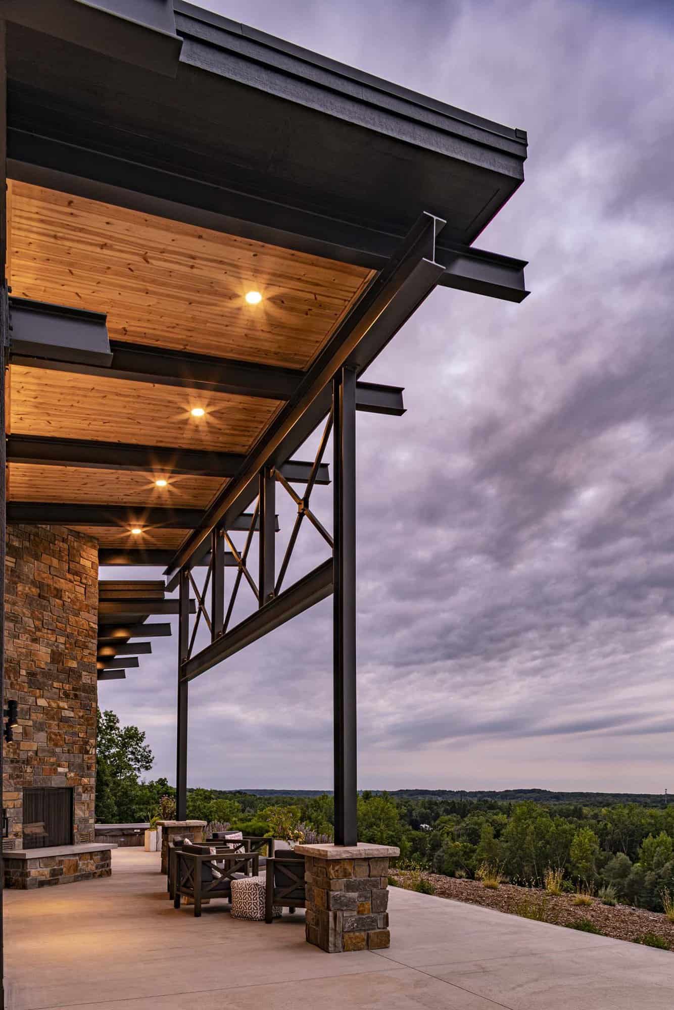 modern-mountain-home-exterior-backyard-patio-at-dusk