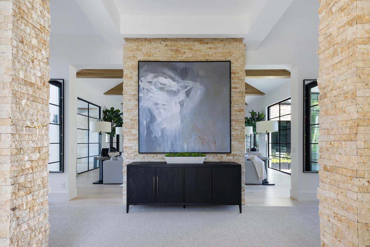 modern-river-house-entry-console-table-and-stone-wall